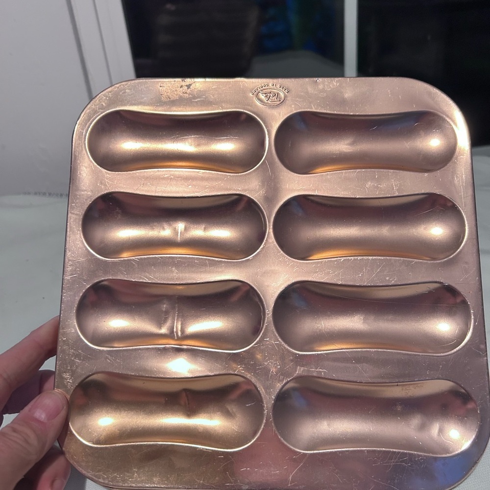 Vintage Tala copper-toned baking mold for eight éclairs. Made in England- used